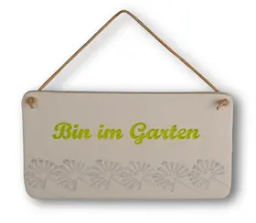 Weißes ovales Tonschild mit grüner Aufschrift "Bin im Garten" mit Pusteblumenverzierung